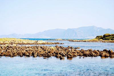 Scenic view of sea against clear sky