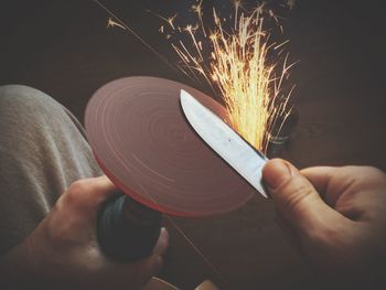 Close-up of man holding knife