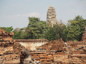 View of temple against cloudy sky