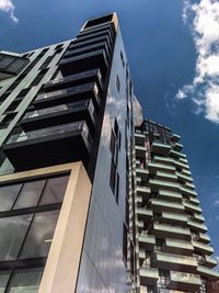 Low angle view of modern buildings against sky