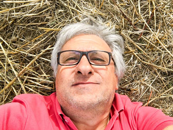 Close-up portrait of man wearing eyeglasses