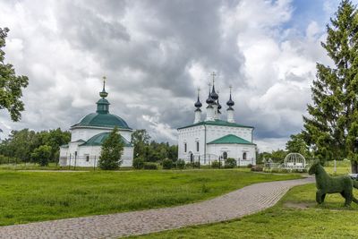 View of cathedral and buildings against sky