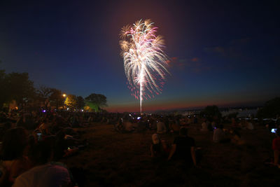 Firework display at night