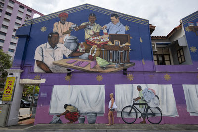 Low angle view of people outside building