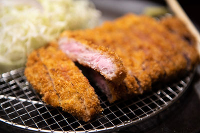 High angle view of meat on barbecue grill