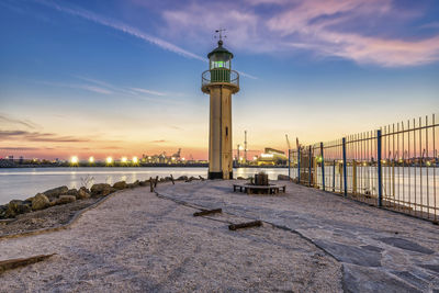 Lighthouse on the shore of the sea