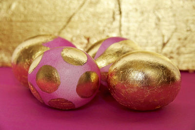 Close-up of pink eggs on table