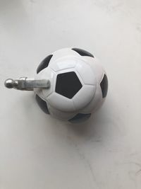 High angle view of soccer ball on table
