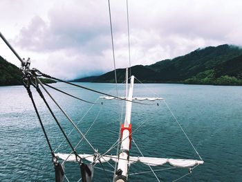 Sailboat on sea against sky