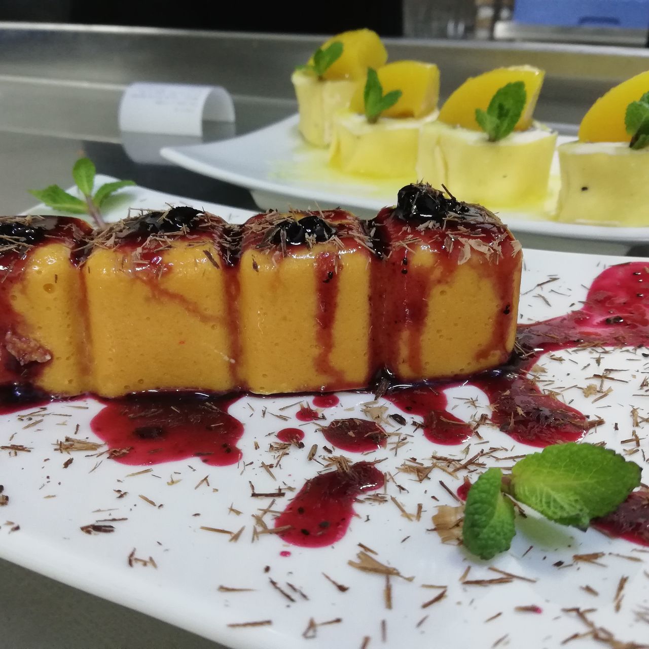 CLOSE-UP OF CAKE WITH ICE CREAM