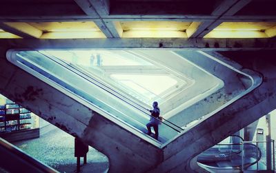 People on escalator