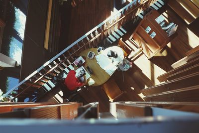 Directly above shot of people sitting in cafe