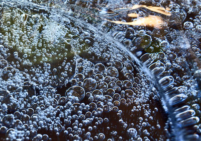 Full frame shot of wet glass