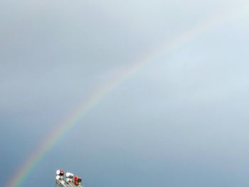 Low angle view of rainbow against sky