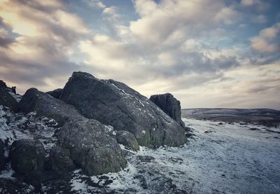 Scenic view of mountains against sky during winter