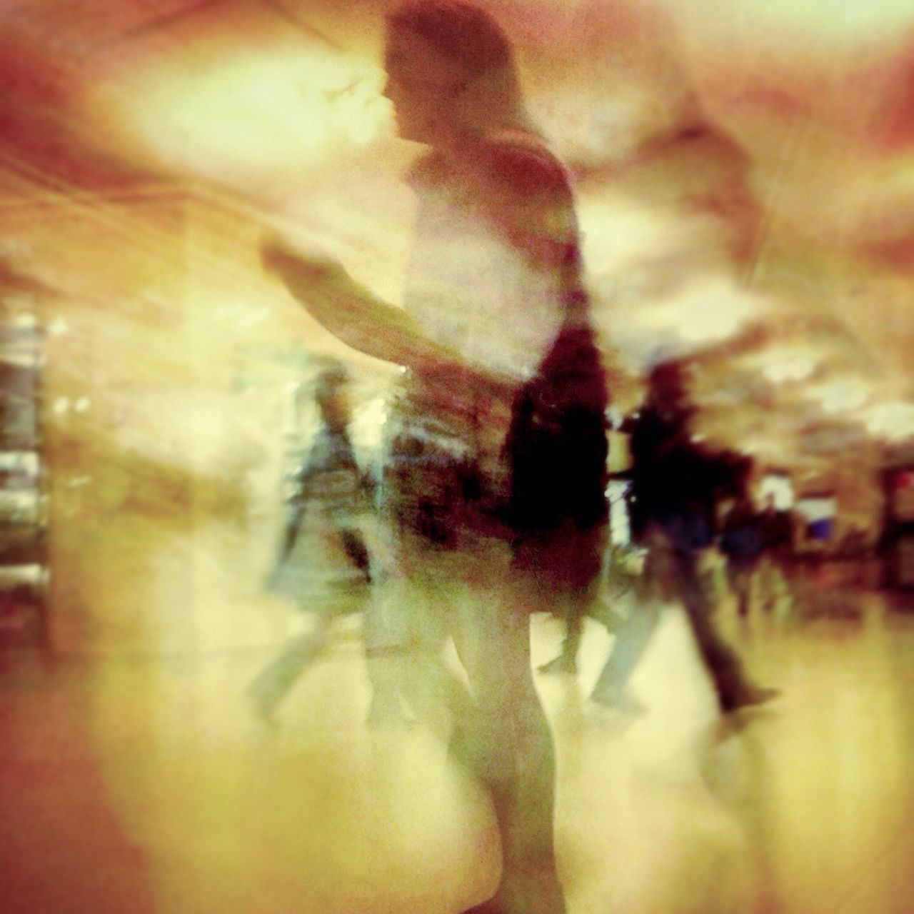 lifestyles, selective focus, leisure activity, focus on foreground, defocused, person, indoors, unrecognizable person, blurred motion, men, reflection, glass - material, close-up, walking, day, street, transparent
