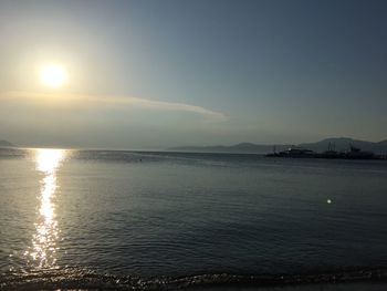 Scenic view of sea against sky at sunset