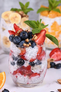 This chia pudding is made with greek yogurt and pieces of fruit and honey