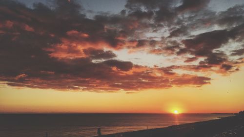 Scenic view of sea at sunset