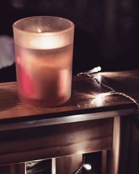 Close-up of tea light candle on table