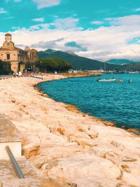 Scenic view of sea against cloudy sky