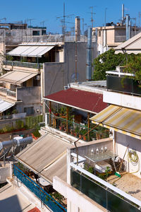 High angle view of buildings in city against sky