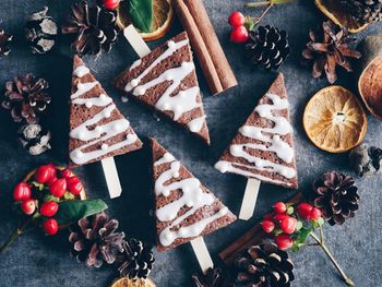 High angle view of cake with christmas decorations on table