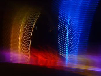 Close-up of illuminated light painting at night