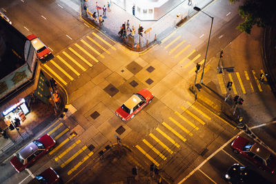 High angle view of people walking on city street