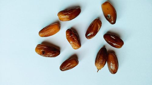 High angle view of fruits over white background