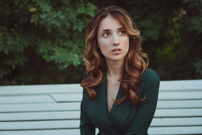 Young woman on a park bench