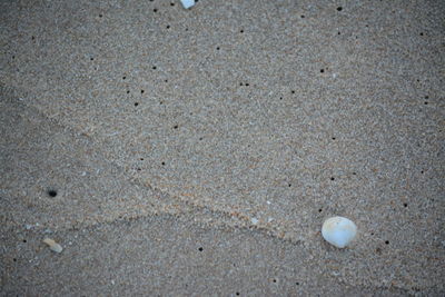 High angle view of stones on sand