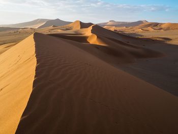 Scenic view of desert against sky