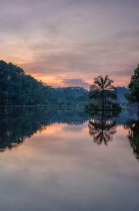 Scenic view of lake against sky during sunset