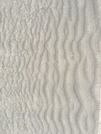 Full frame shot of sand on beach