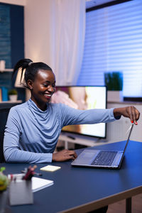 Young businesswoman working at office