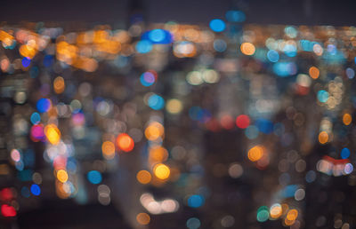 Defocused image of illuminated lights at night