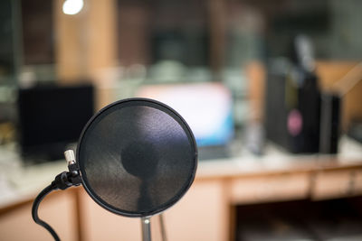 Close-up of microphone in sound recording studio