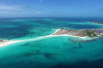 Drone view of beach with clear water in los roques, caribbean sea, venezuela