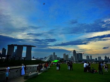 People in city against clear sky