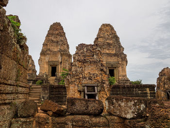 Old ruins of building against sky