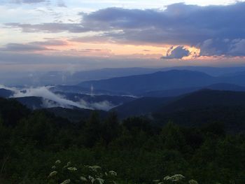 Scenic view of mountains against sky during sunset