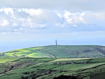 Scenic view of land against sky