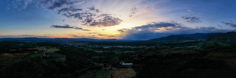 Scenic view of landscape against sky during sunset