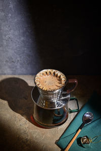 Closeup barista hot coffee drip maker