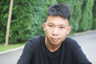 Portrait of boy at street