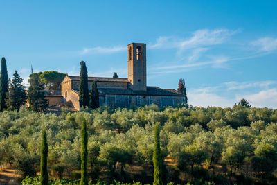 Skyline of monte oliveto abbey near little town of san gimignano, tuscany