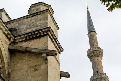 Low angle view of old building against sky