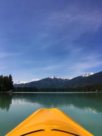 Scenic view of lake against blue sky