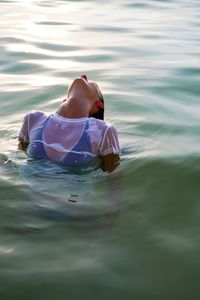 Man swimming in pool